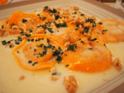 tortelli alla zucca al taleggio 11 pumpkin ravioli served with taleggio cheese cream and walnuts